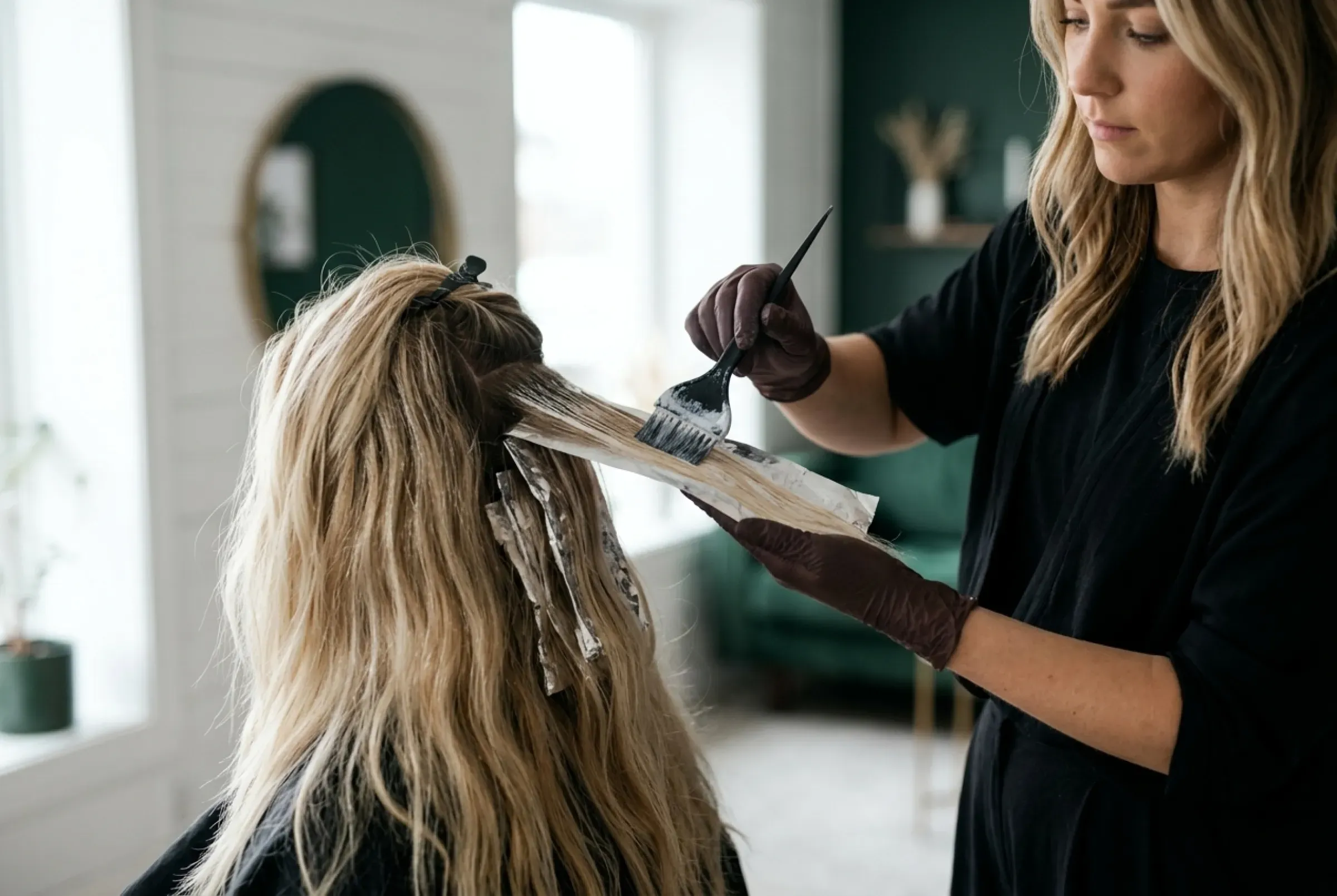 Slingor och balayage hos Fusion i Uppsala